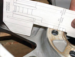 Verify that edge of the caliper does not touch the rim or the spoke